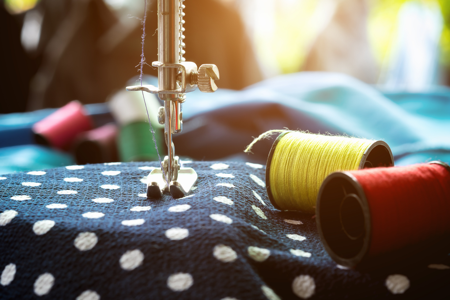 Sewing Machine with Polka Dot Cloth and Colorful Threads